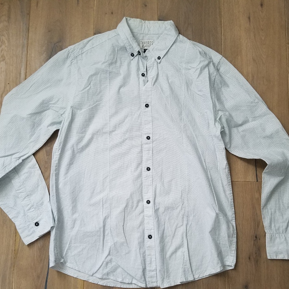 White dotted pattern button up shirt